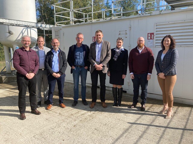 Delegation at Hereon in front of Hydrogen testing facility. From right to left: Jacqui Caine, Ben Reriti-Jones, Dr Regina Eisert, Ross Copland.