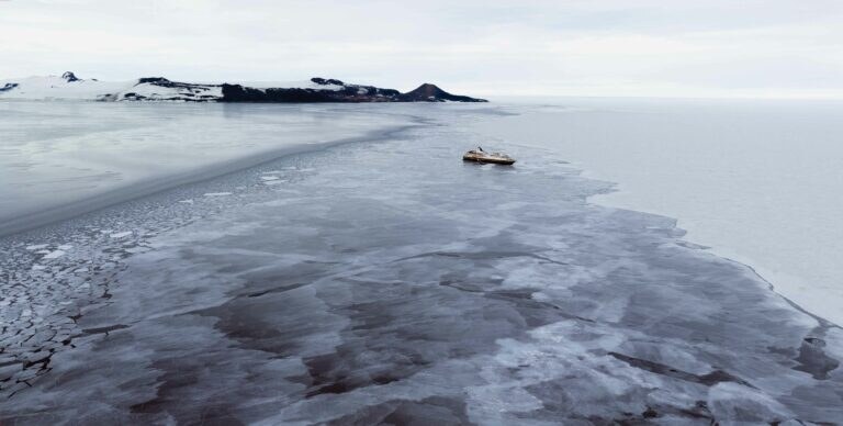 The Heritage Adventurer in front of Ross Island in McMurdo Sound, Antarctica. Photograph: Colin Aitcheson.